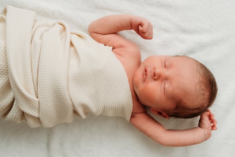 Lifestyle newborn photography portrait.