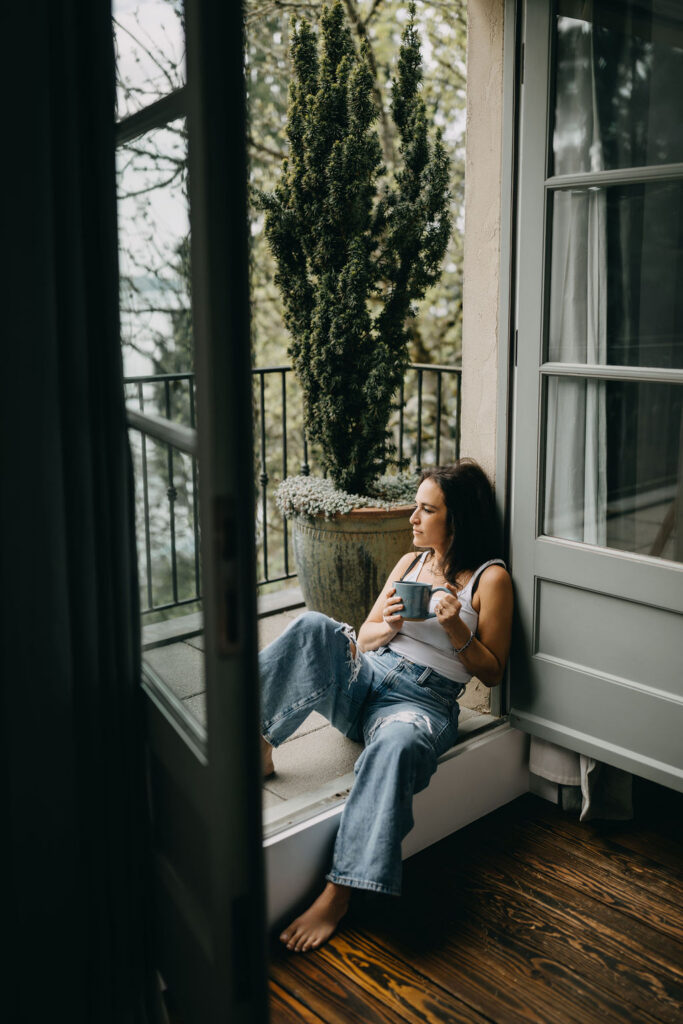 A successful portrait business owner implementing growth strategies after receiving 1-on-1 photography business coaching.