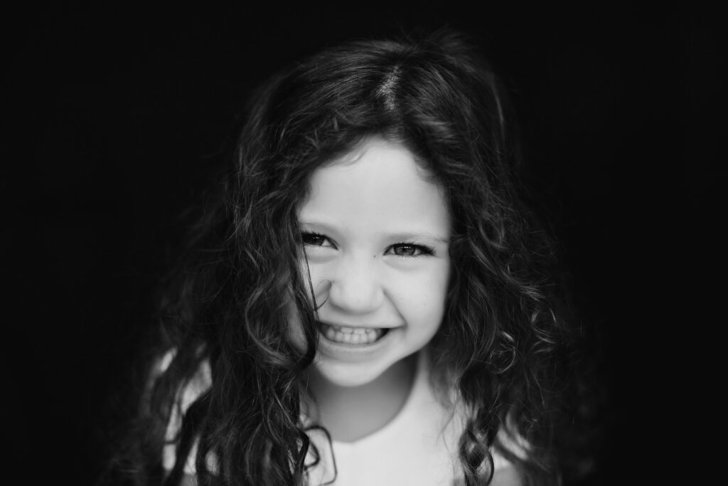 Elena S. Blair sharing school photography portfolio tips for family photographers looking to pitch schools.
