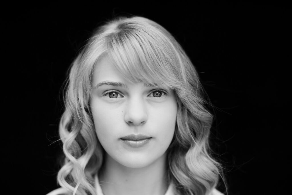 A timeless student portrait showing the connection-driven style taught in Elena S. Blair's boutique school system.