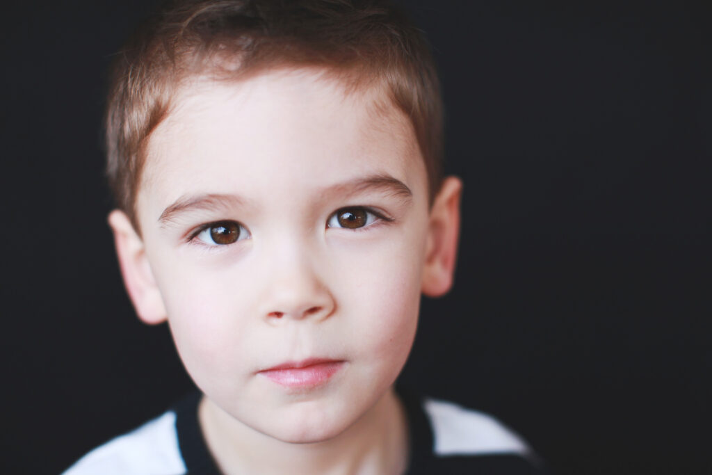 A timeless, connection-driven child portrait illustrating boutique school photography profit margins.