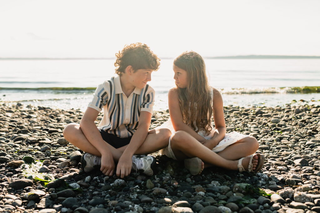 A warm, authentic lifestyle portrait showing the clear artistic style used to attract high-paying family clients.