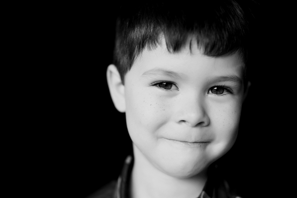 A timeless child portrait illustrating the connection-driven style used in a boutique school photography system.
