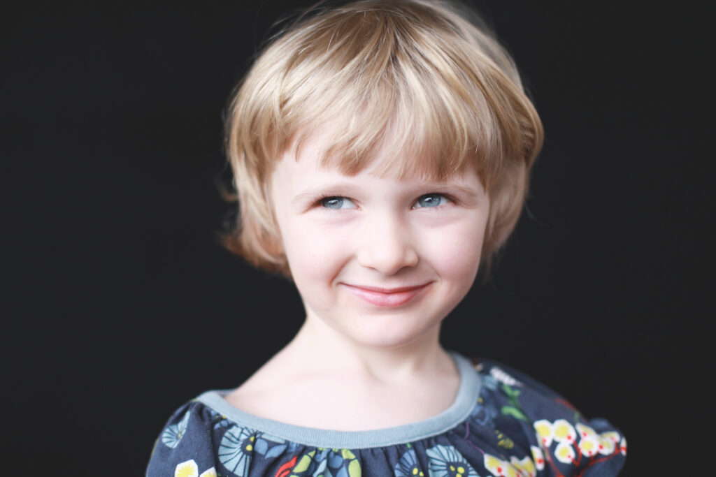 A timeless child portrait showing the soft, natural results achieved with a simple one-light setup.