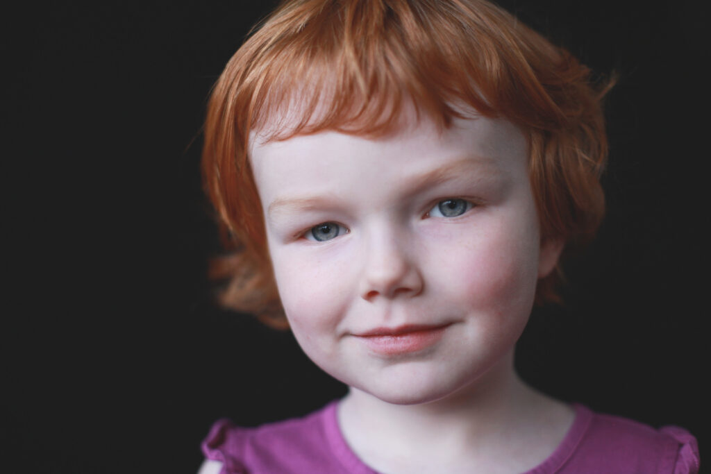 A timeless child portrait showing the soft, natural results achieved with a simple one-light setup.