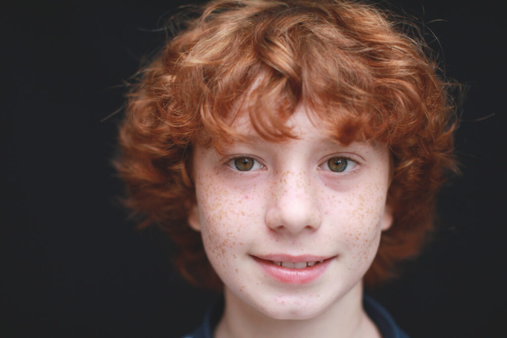 A timeless student portrait showing the connection-driven boutique school style that attracts private family clients.